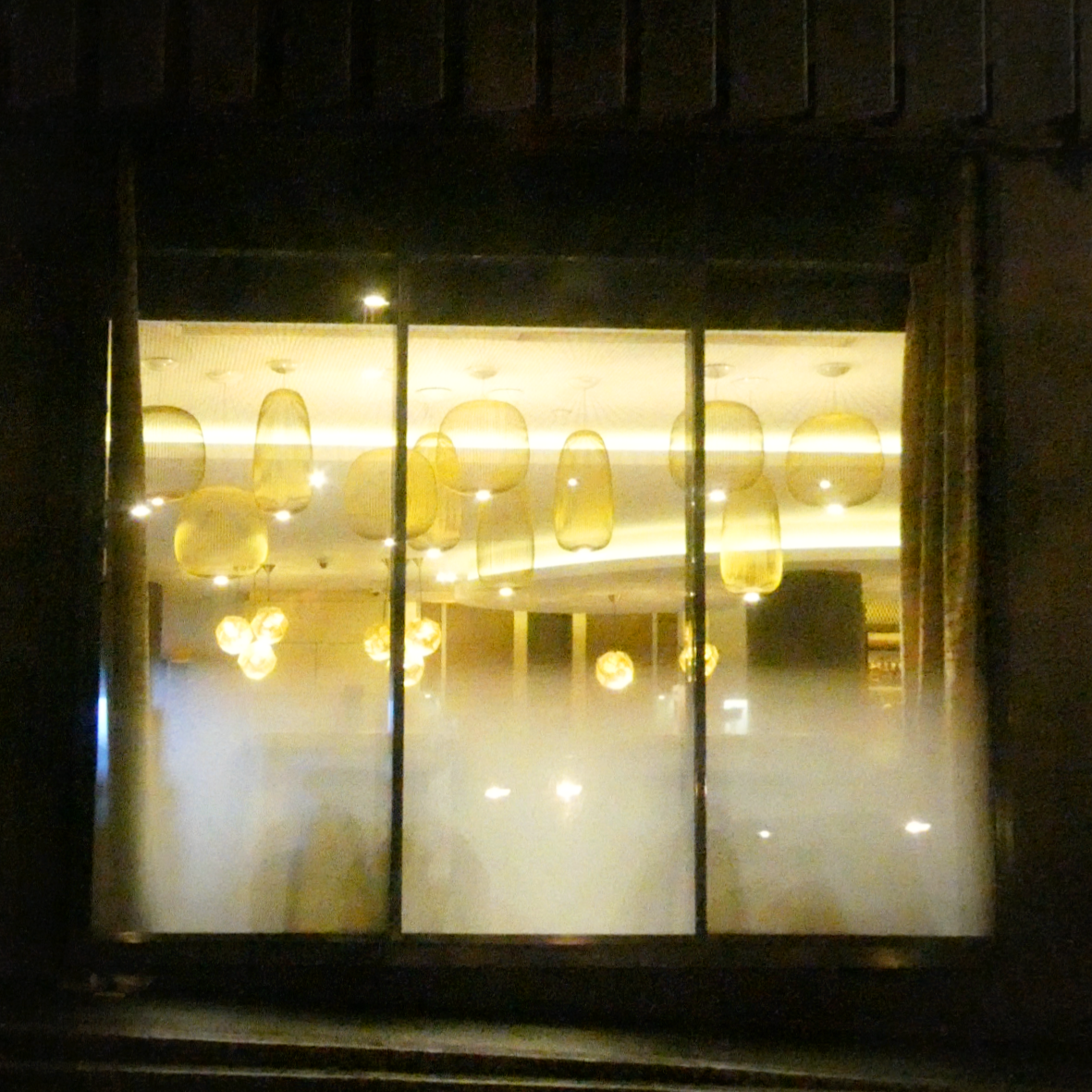 photos de nuit à Paris depuis le siège passager